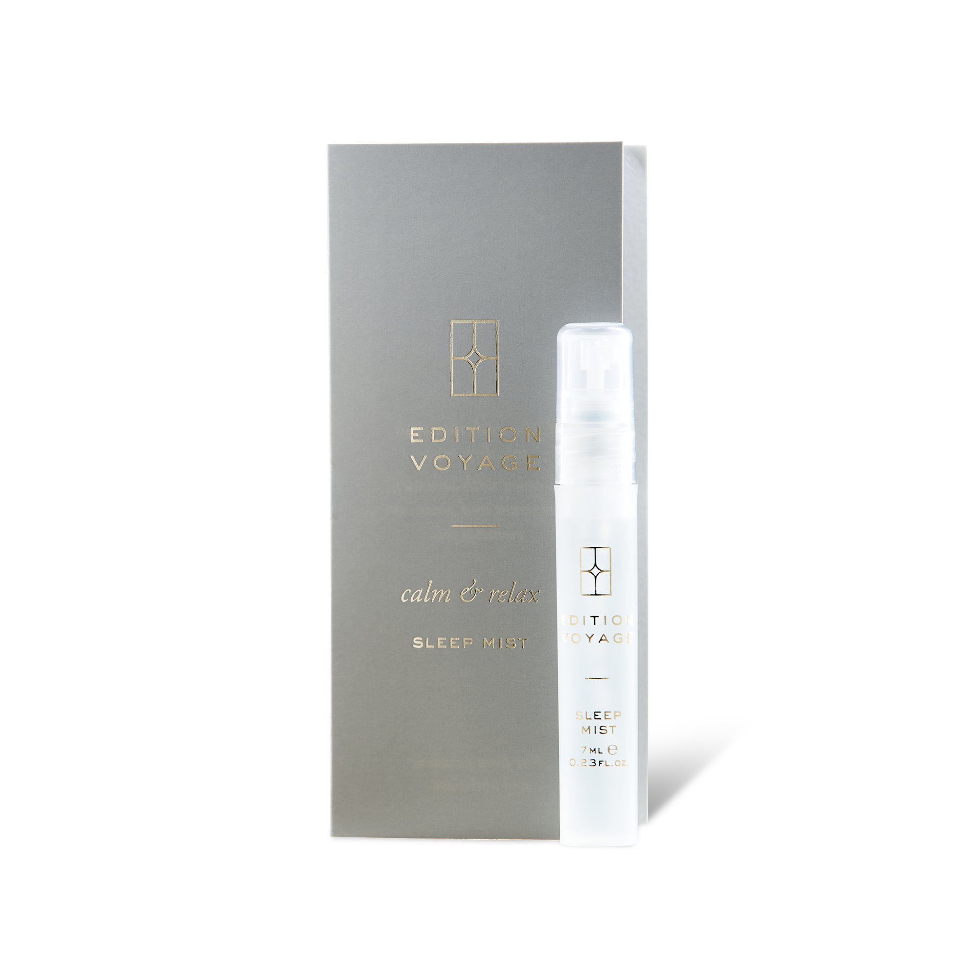 An Edition Voyage calm & relax Sleep Mist vial standing next to its minimalist grey packaging box.