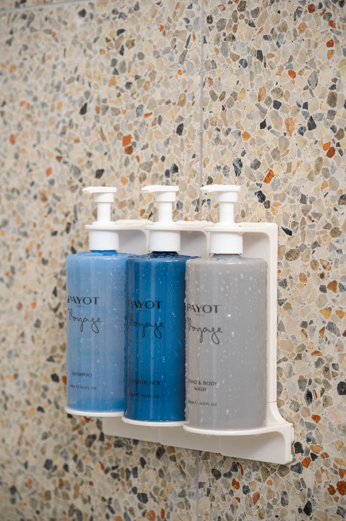 PAYOT luxury Hotel bath Amenities Range by Buzz Products Pluma Bracket System Range Refillable Bottles for for AirBnB Hotels Hospitality