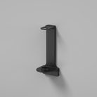 Pluma single wall mount amenity bracket system in matte black for one dispenser bottle.
